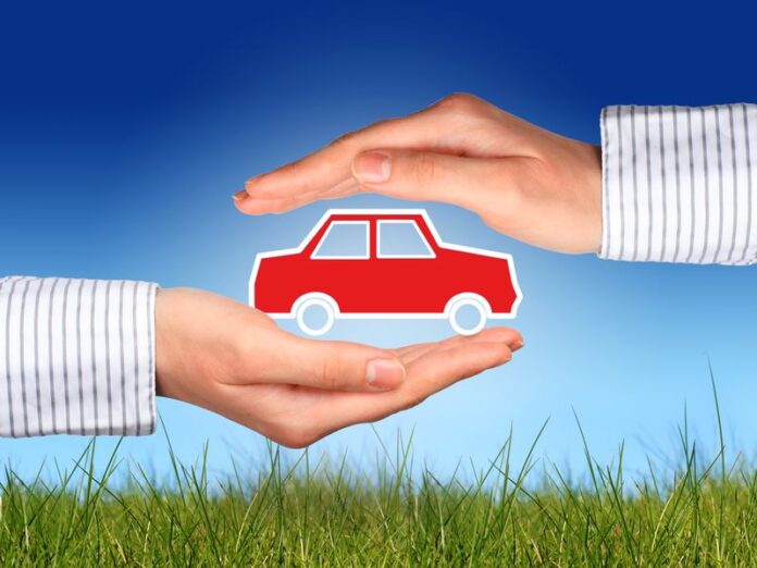 20332571 - hands and car. car insurance concept.